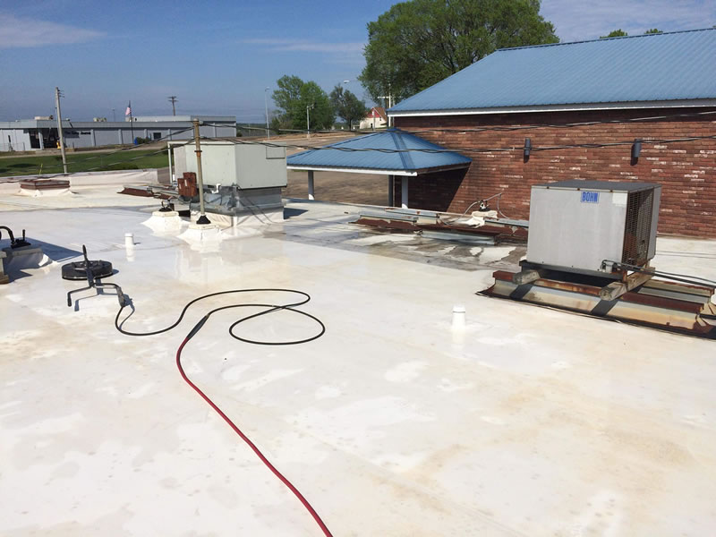 Commercial Roof Cleaning by Rain Tight Roof Group